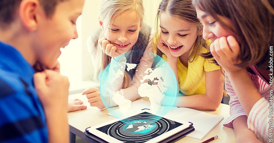 group of school kids with tablet pc in classroom