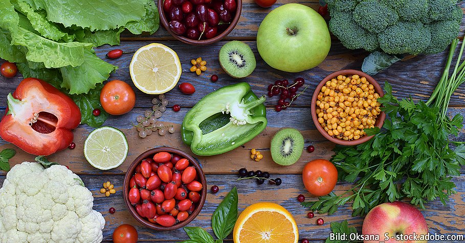 Composition of products containing ascorbic acid, vitamin C - citrus, cauliflower, broccoli, sweet pepper, kiwi, dog rose, tomatoes, apple, currant, sea buckthorn, dogwood. Top view. Flat lay.