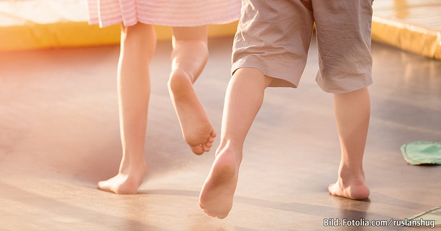 children's legs running on the trampoline